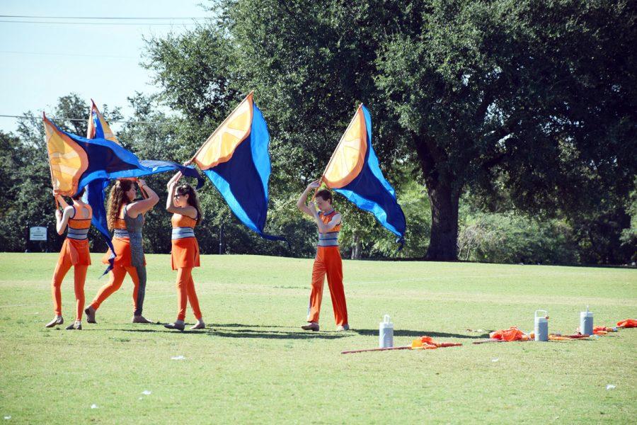 The Color Guard practices their routine in preparation for the Area Band competition.