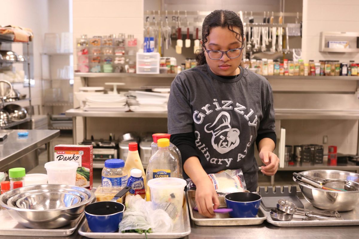 Prepping the ingredients for Chicken Katsu, Kaniya Salazar makes sure everything is in its place. Salazar's favorite dishes usually include the Asian genre. 