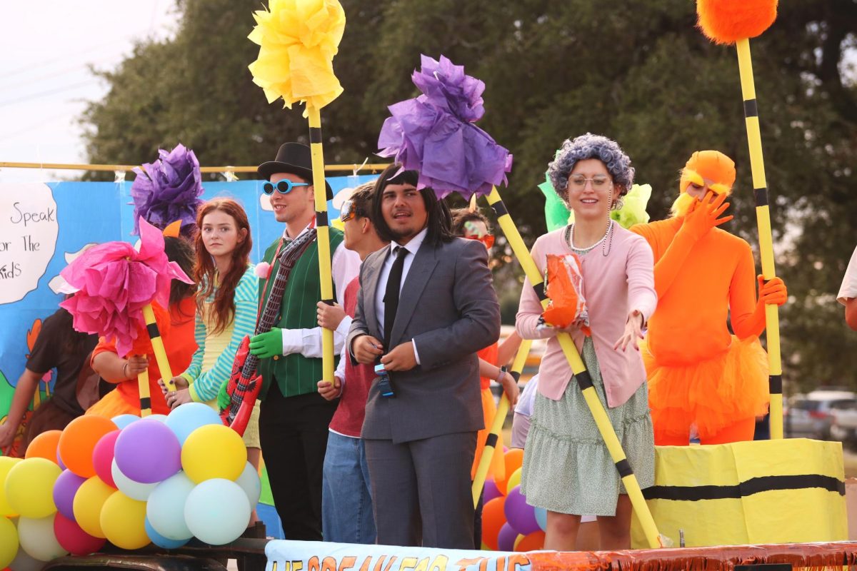 Dressed as the cast of the Lorax, PALS decorated their float just hours before the parade. Despite the late start, PALS snagged third place in the float competition.